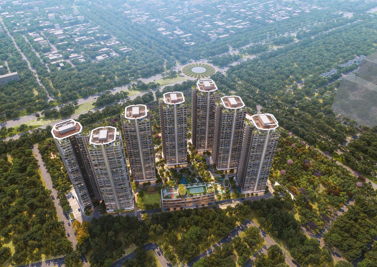 Aerial view of the towers among low-rise neighbours and trees